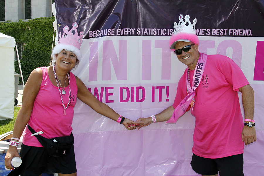 Chicago June 5: Two Participants In Front Of A "we Did It!" Po