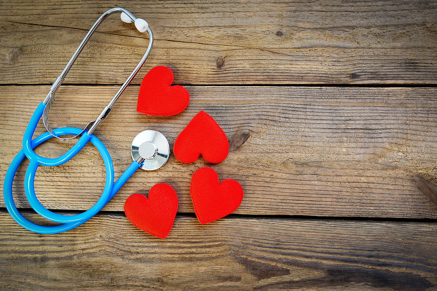 Heart Health And Red Heart With Stethoscope On Wooden Background