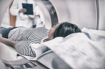 Female Patient Undergoing Ct Scan In Hospital
