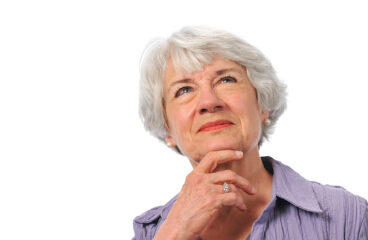 Senior Lady Looking Up And Thinking