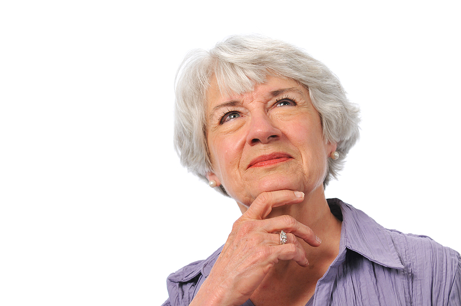 Senior Lady Looking Up And Thinking
